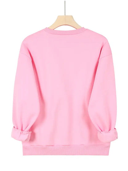 Sweatshirt med glitrende hjerte | Sammen mot brystkreft