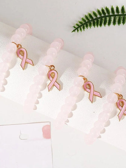 Perlearmbånd med rosa bånd | Sammen mot brystkreft